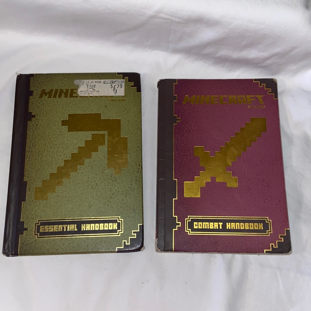 Minecraft: Essential Handbook hard cover and combat handbook soft cover
